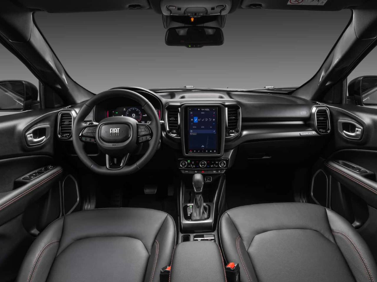 Stellantis vai lançar 7 carros híbridos no Brasil em 2026; veja quais Interior da Fiat Toro 2026 com freio de estacionamento eletrônico