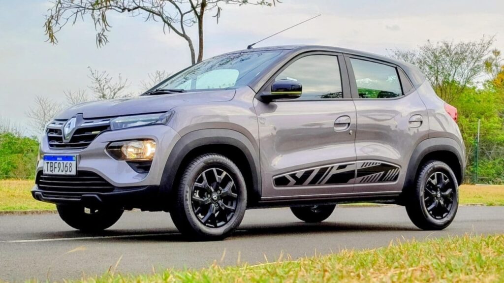 Renault Kwid Zen 2026 cinza, vista lateral esquerda mostrando perfil completo
