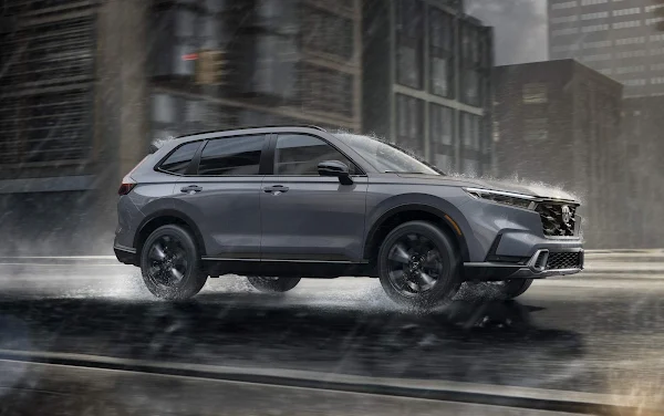 Honda CR-V 2026: Por que ele virou destaque Honda CR-V 2026 - na cor cinza - visão lateral direita - em movimento