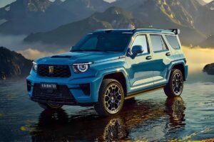 GWM Tank 700 atualizado, vista frontal 3/4 em estúdio, carroceria grande e acabamento premium