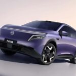 Nissan NX8 prata, vista frontal 3/4 em estúdio, destaque para a assinatura de LED e porte de SUV médio-grande