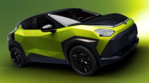 Nissan Juke 2027 elétrico, vista frontal 3/4 em estúdio, carroceria compacta e assinatura luminosa moderna