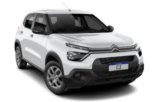 Citroën C3 e Ora 03 2026: O que mudou de verdade Citroën C3 2026 branco, vista frontal 3/4 em ambiente urbano, destacando a grade e os faróis